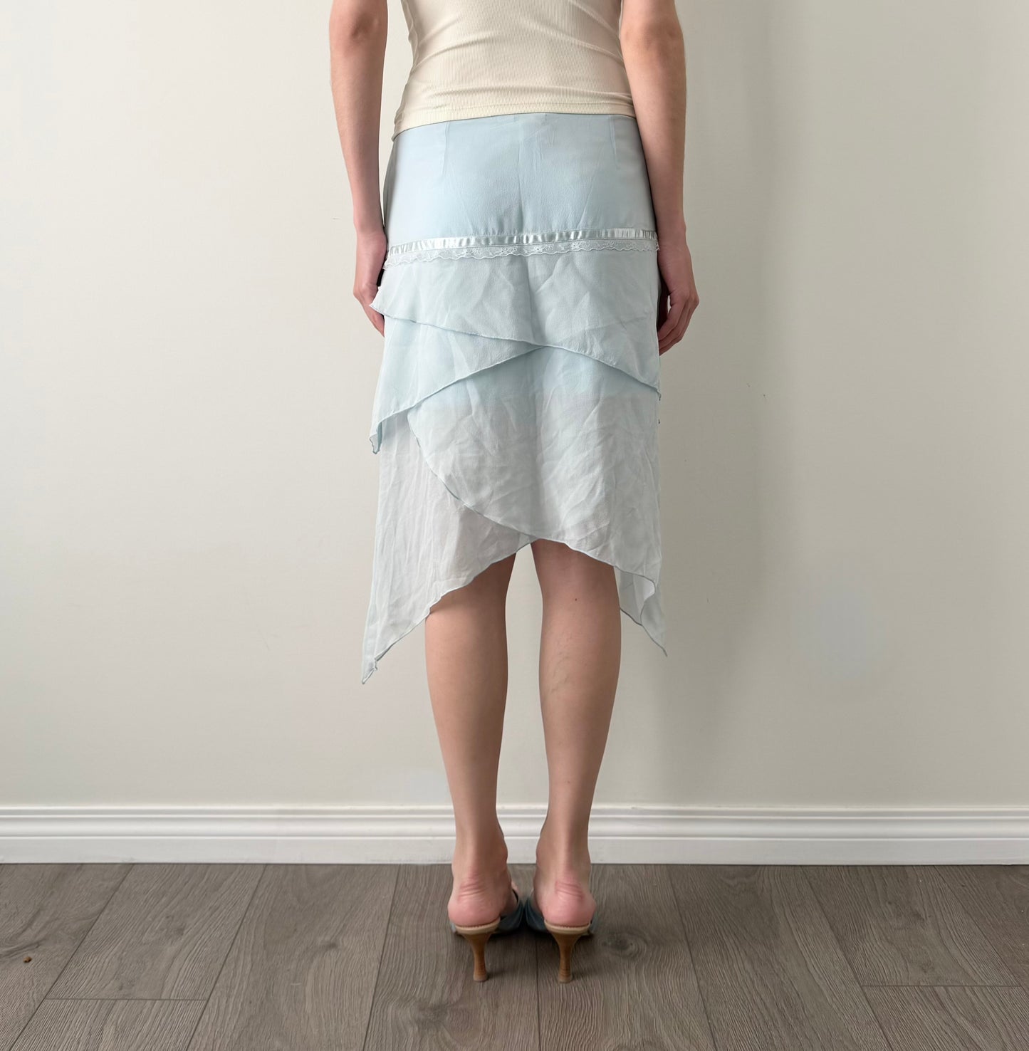 Kenzie 100% silk light blue asymmetrical skirt.