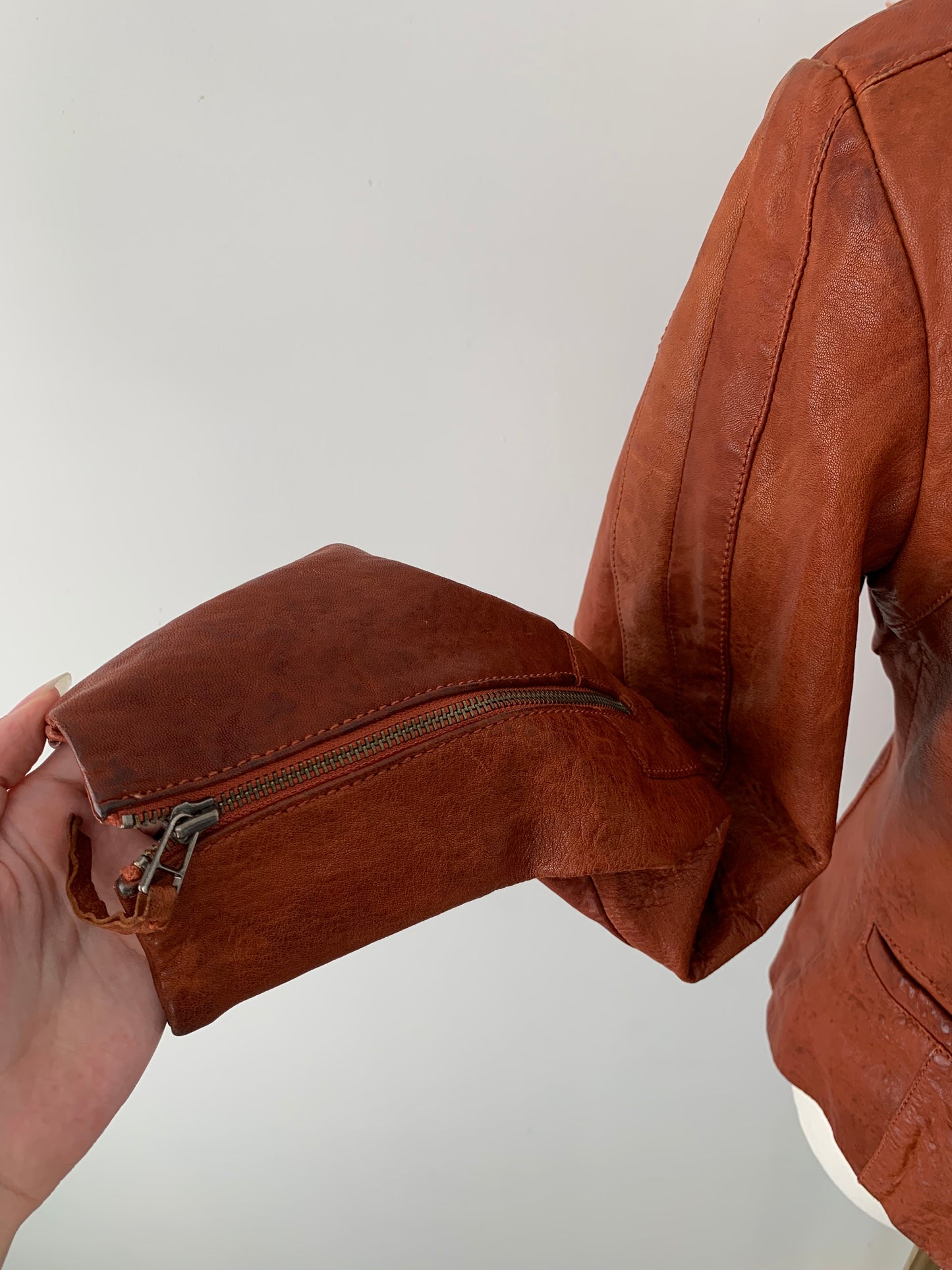 Danier copper leather zip up jacket