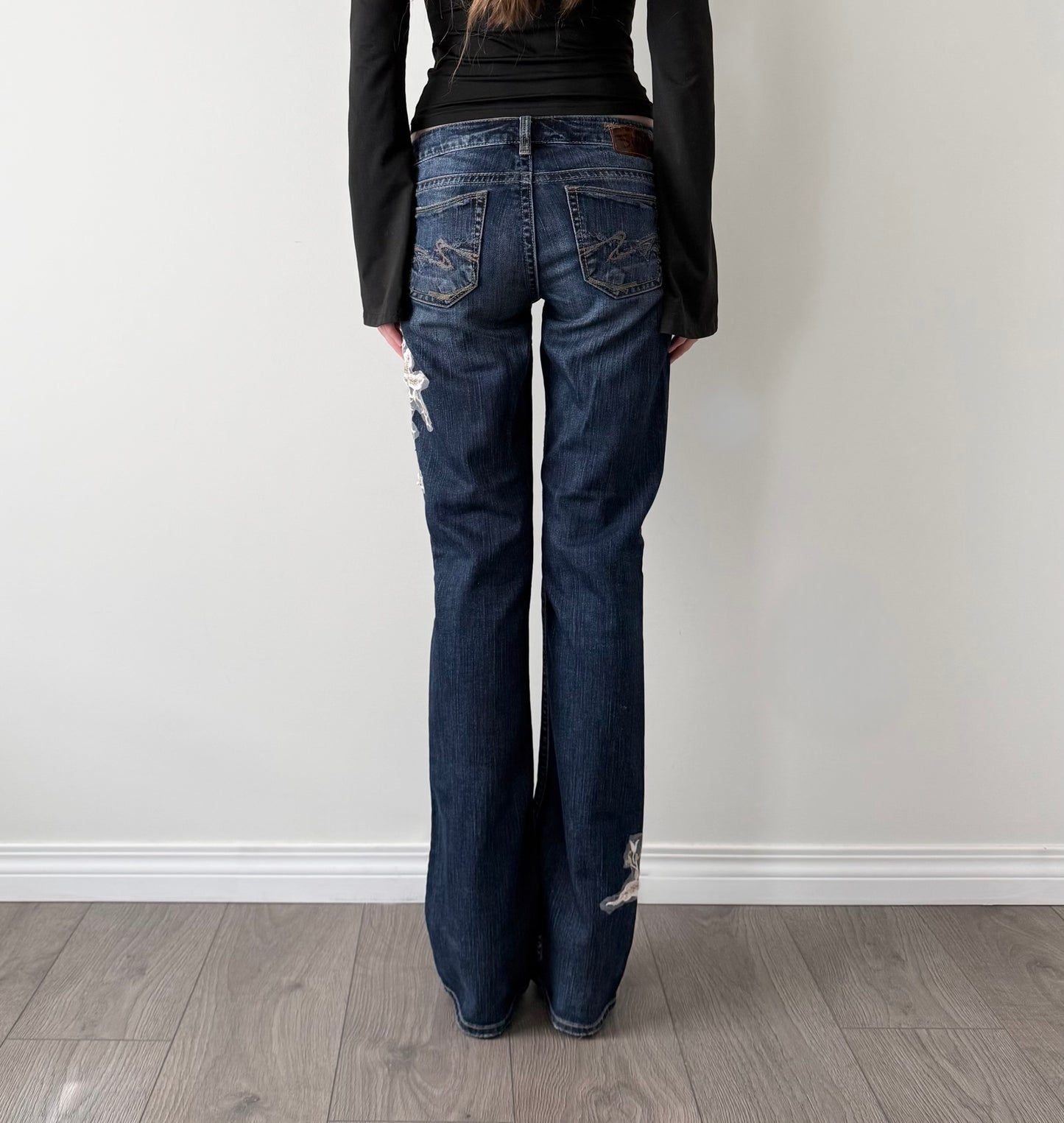 Silver reworked dark wash lace flared jeans