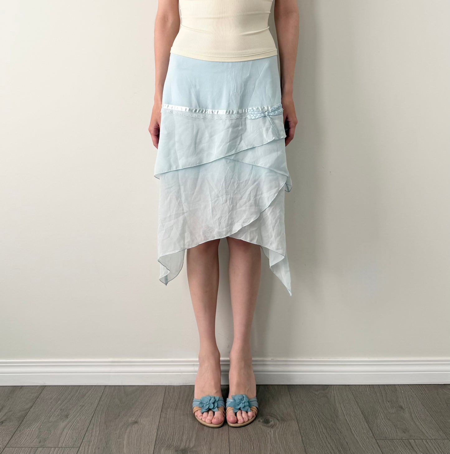 Kenzie 100% silk light blue asymmetrical skirt.