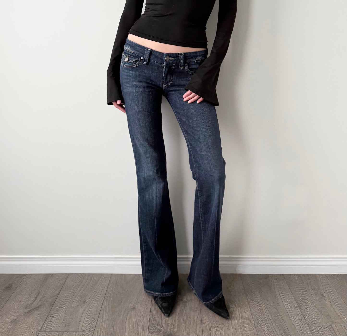Paige low rise flare dark wash jeans
