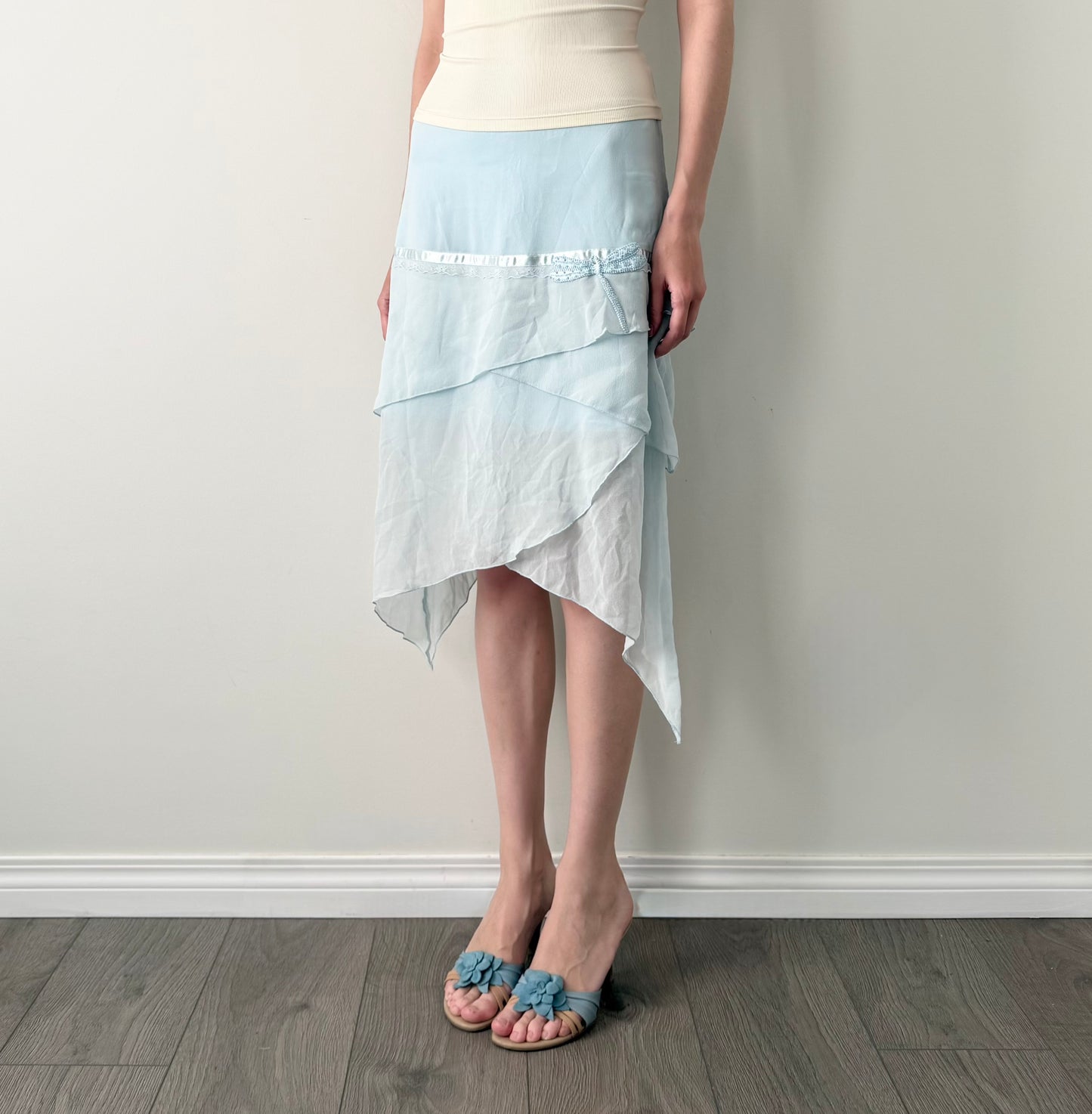 Kenzie 100% silk light blue asymmetrical skirt.