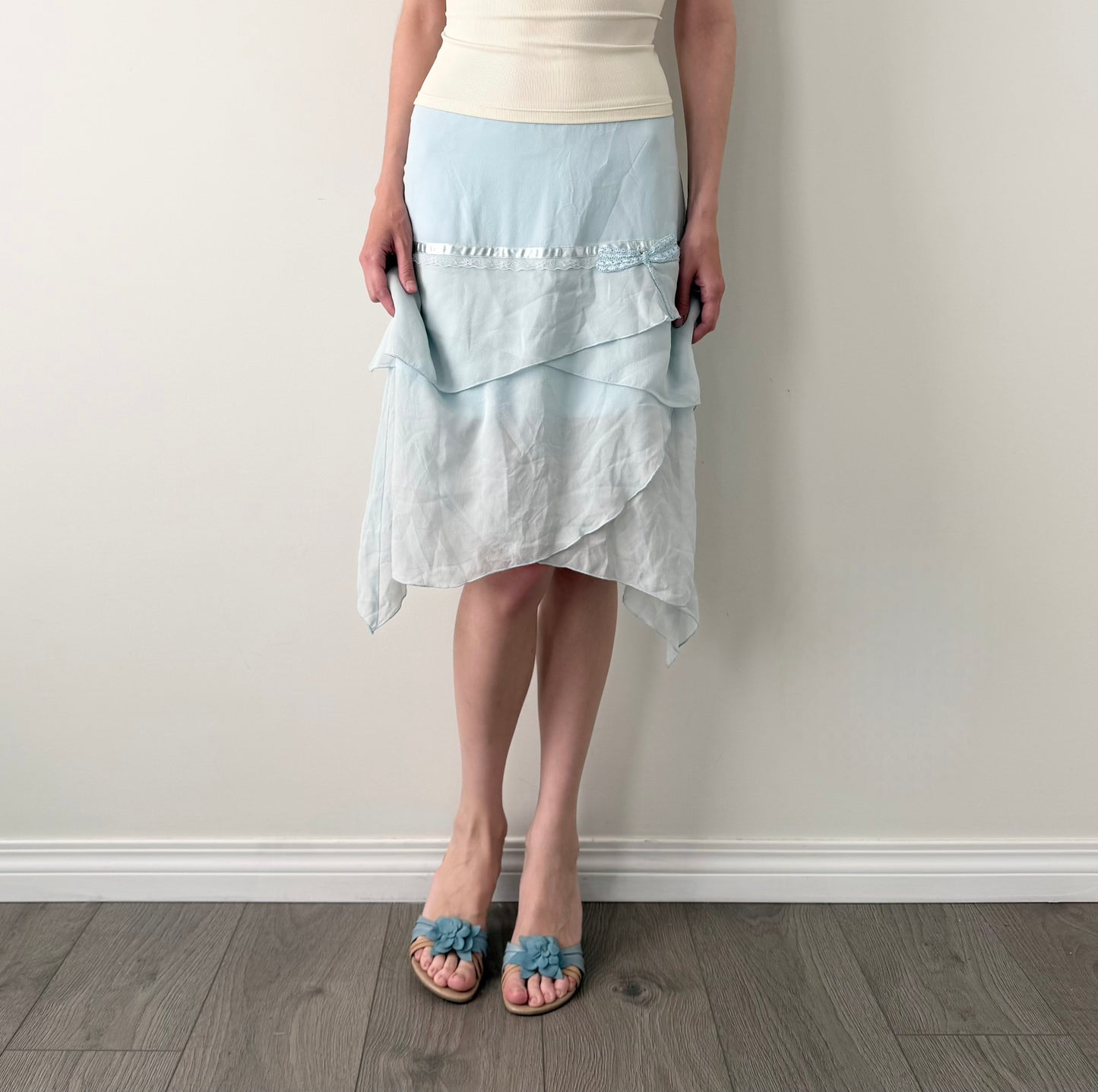Kenzie 100% silk light blue asymmetrical skirt.